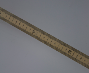 Photo of a metal meter stick. Go metric or go home!
