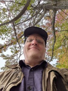 A photo I took of myself at the No Kings protest in the last few months. 